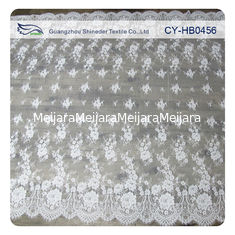 中国 印刷されるアイボリーのナイロン花の Chantilly Embroideried のレースの生地の習慣 サプライヤー